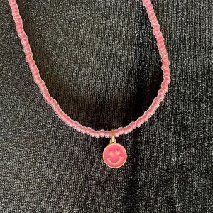 Handmade seed bead necklace with smiley face charm